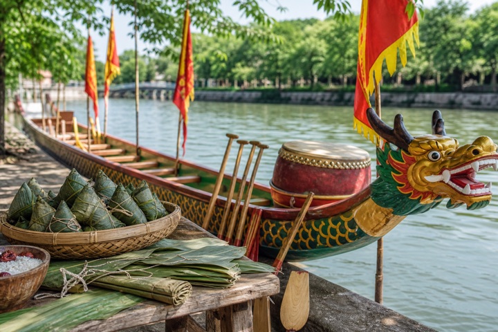 Dragon boat paddles and drum arranged for a festival race